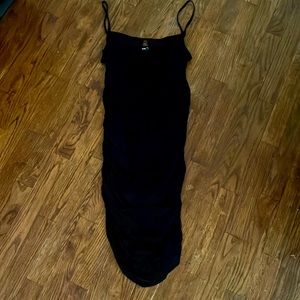 Large tight fitting black dress